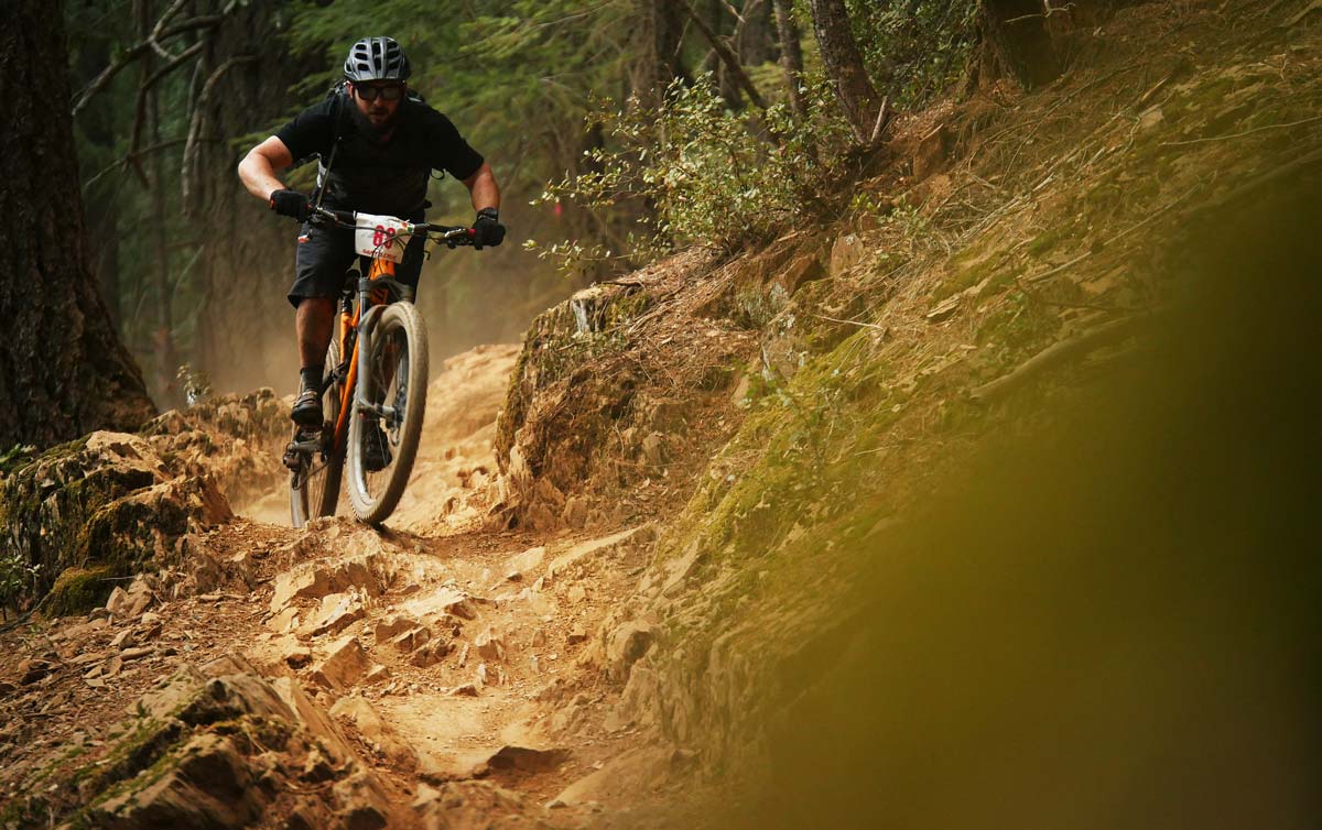 mountain bike racer on the jagged rocks of Thrid Divide